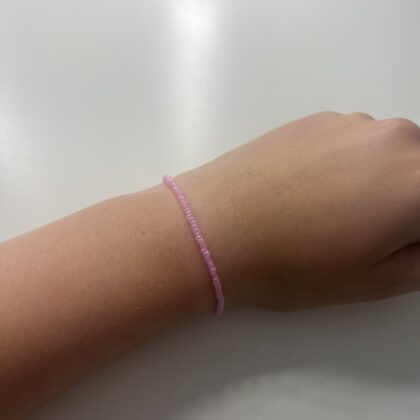 Lyserødt armbånd